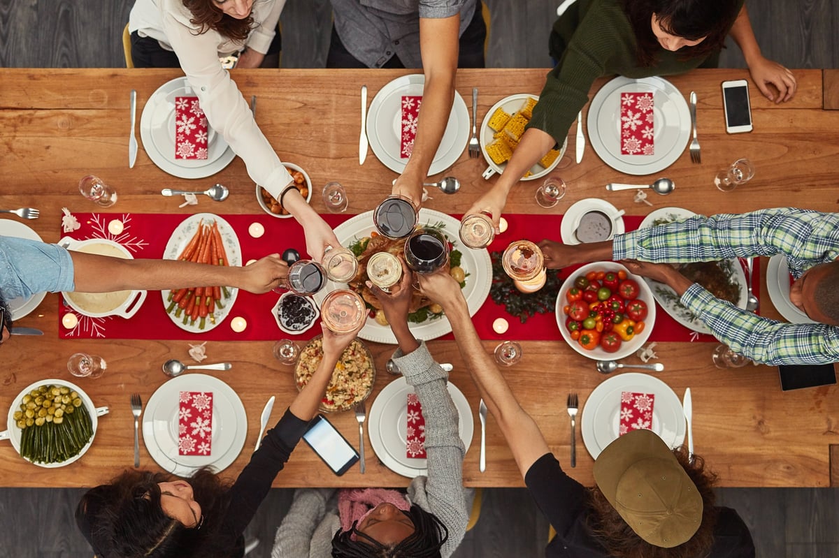 Residents sharing a meal and a toast together